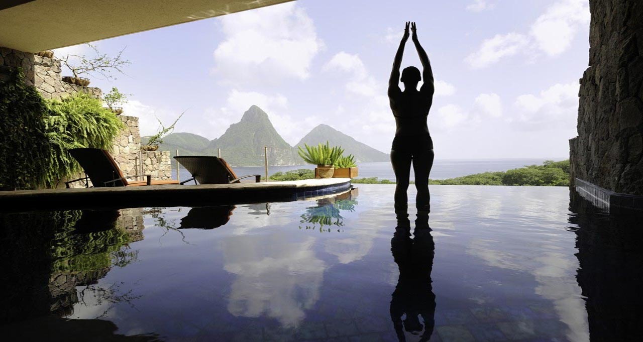 Woman doing yoga in a pool